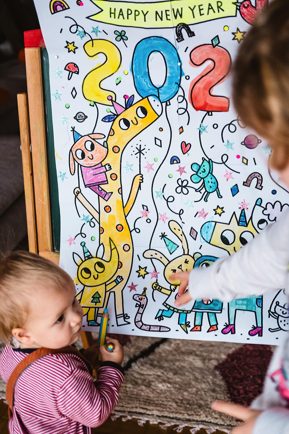 Wir feiern ins neue Jahr mit dem Ausmalposter "Happy New Year 2024".