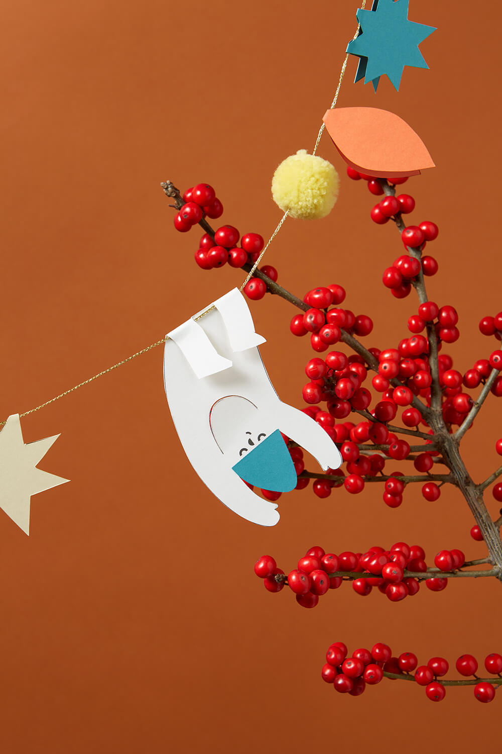 Wir basteln eine Wichtelgirlande für Weihnachten aus Papier.