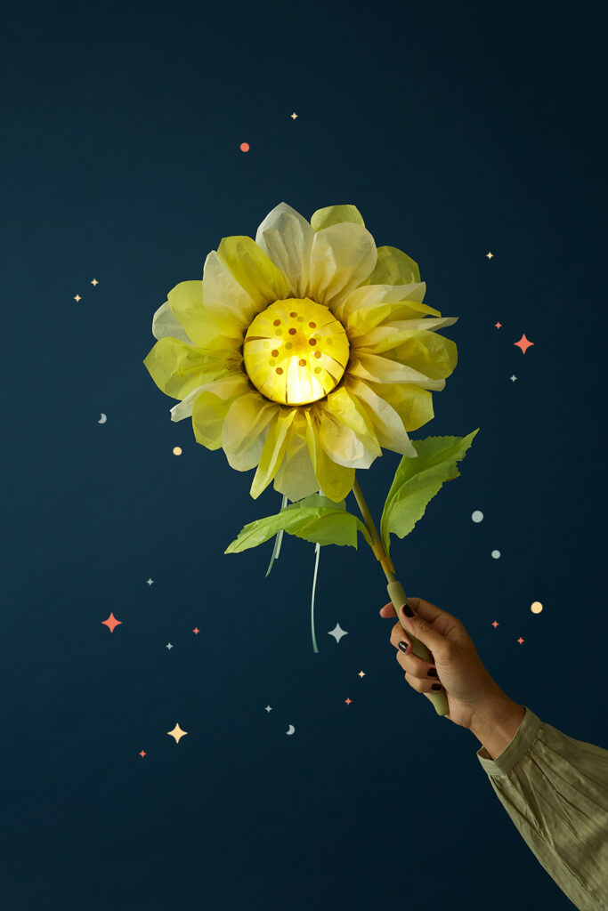 Lass uns eine Sonnenblumen-Laterne basteln.