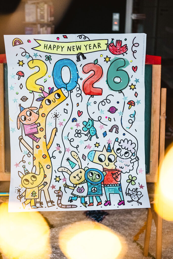 Lass uns an Silvester das Ausmalposter "Happy New Year 2026" ausmalen.