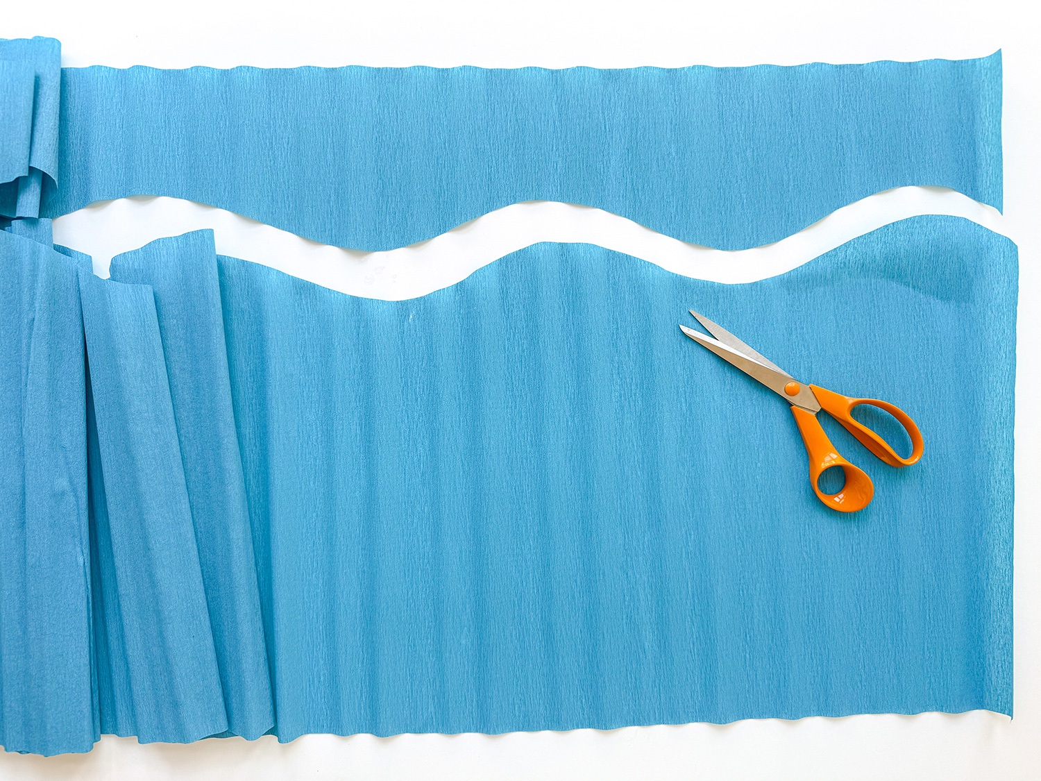 Lass uns die Unterwasser-Schultüte zur Einschulung basteln.